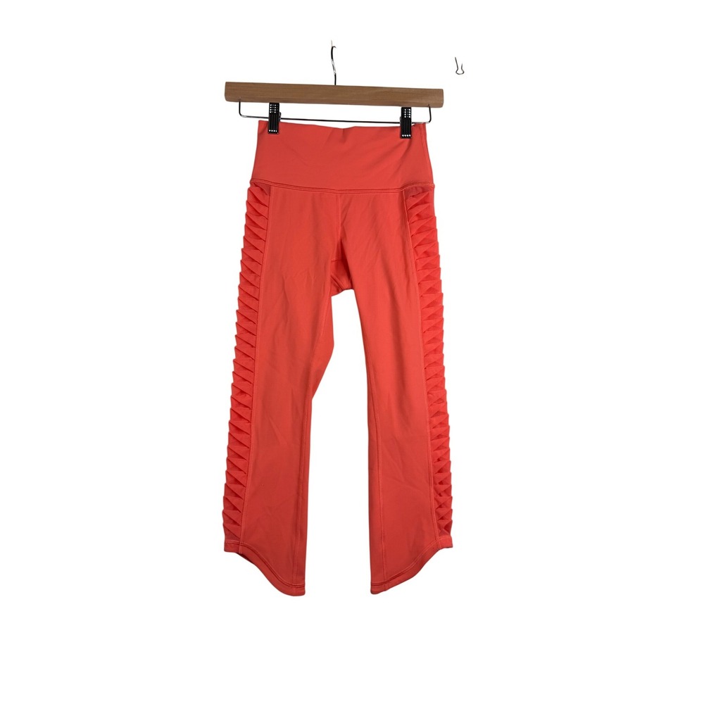 Lululemon Cropped Side Mesh Asymmetrical Hem Leggings size 2 Orange